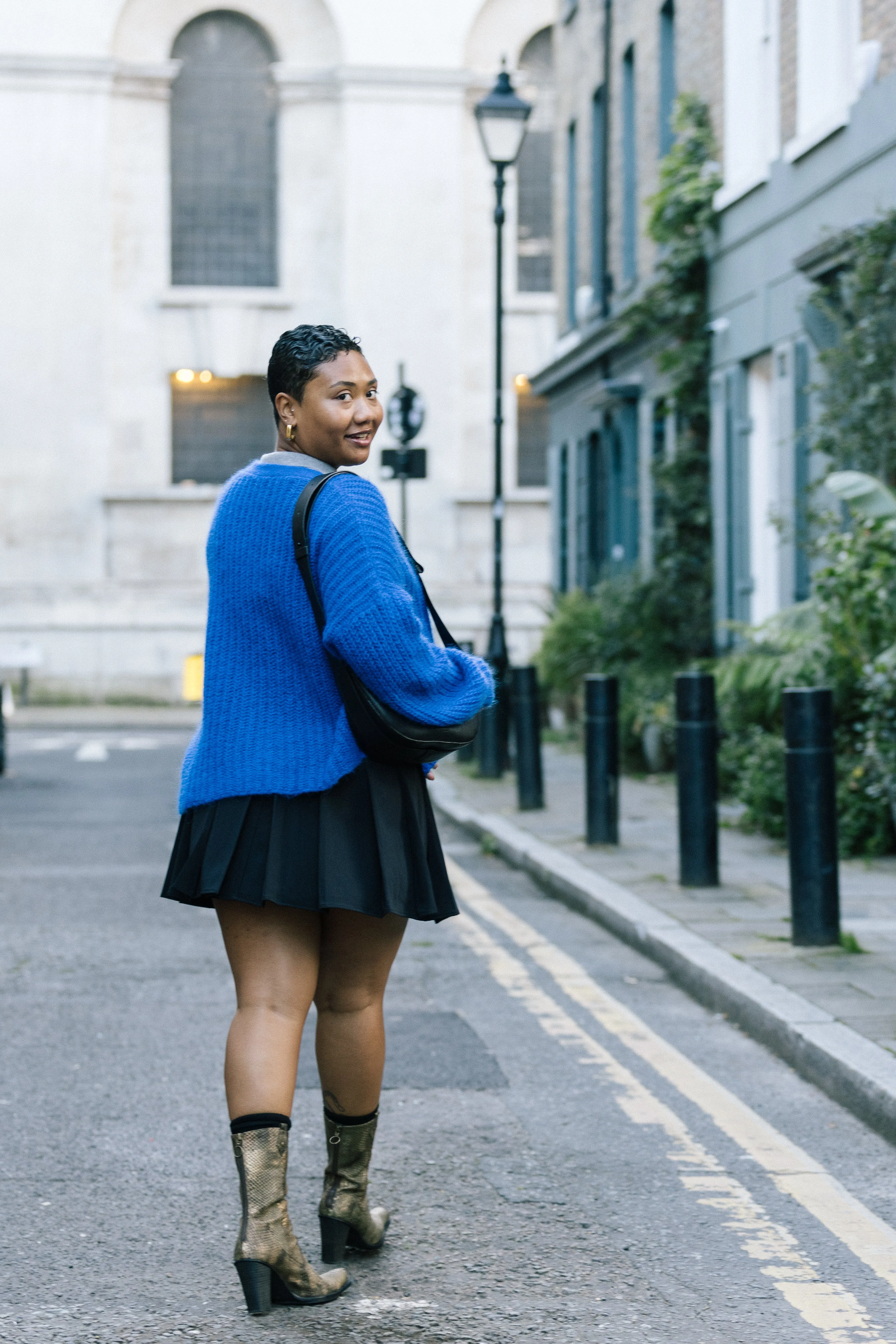 Black Tailored Pleat Mini Skirt by Albaray