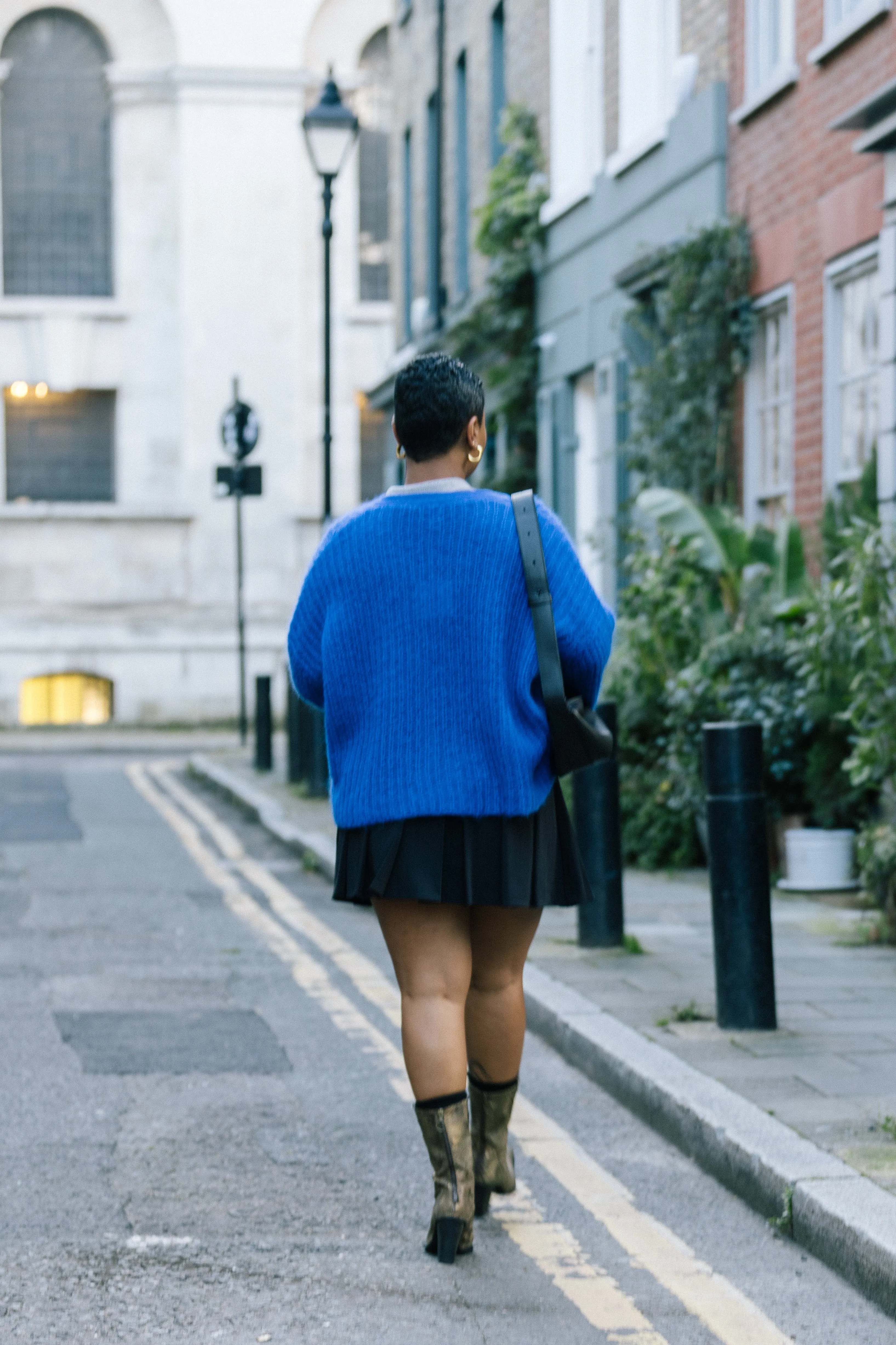 Black Tailored Pleat Mini Skirt by Albaray