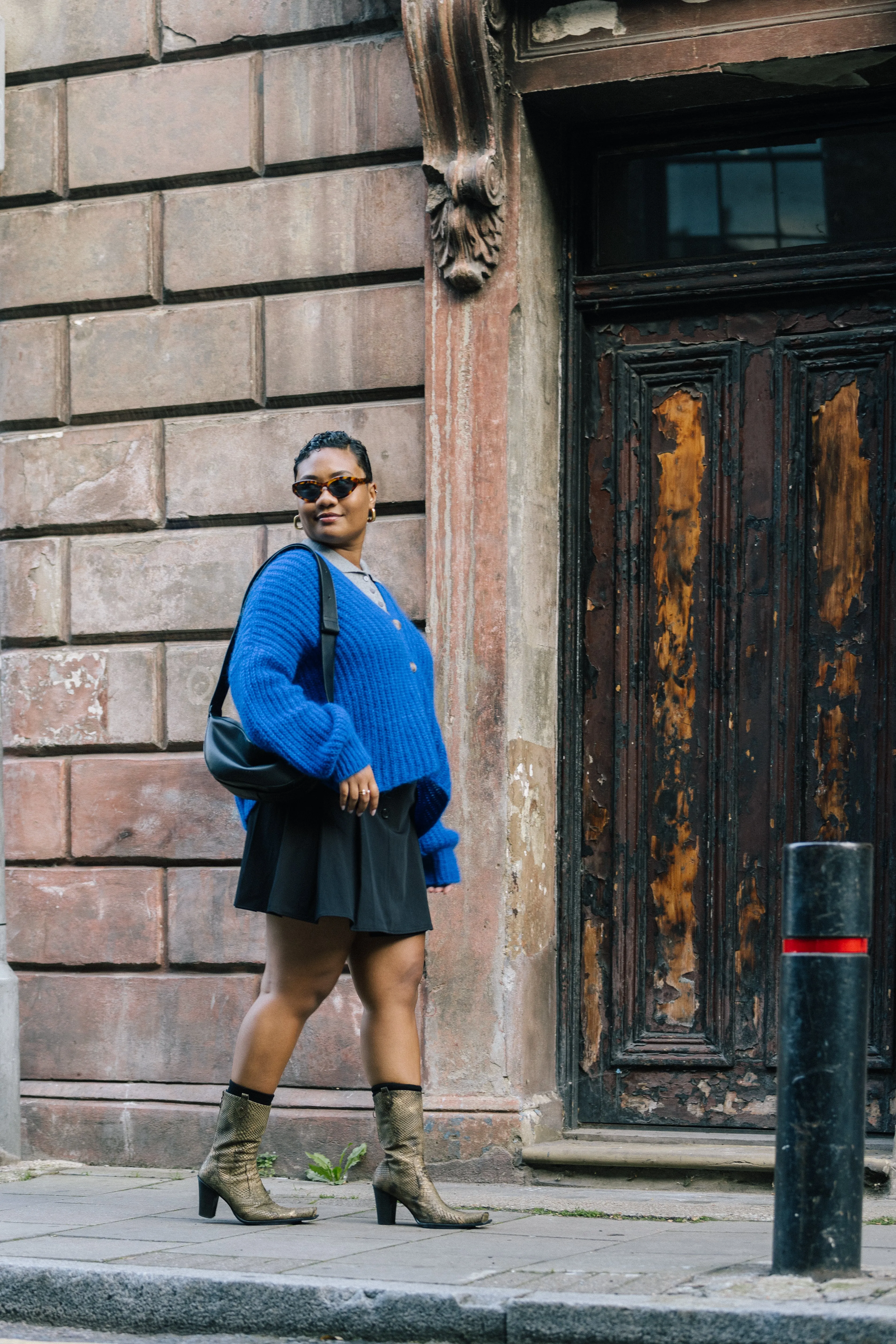 Black Tailored Pleat Mini Skirt by Albaray
